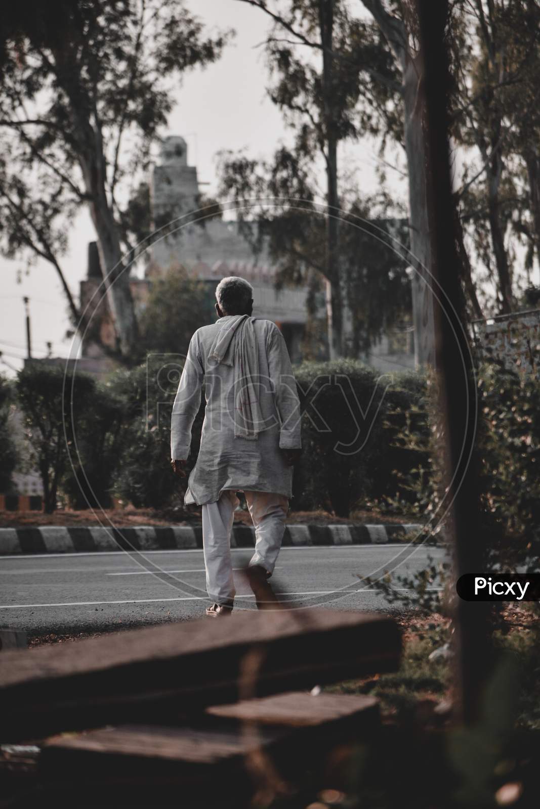 Indian Old Man , old man walking on road