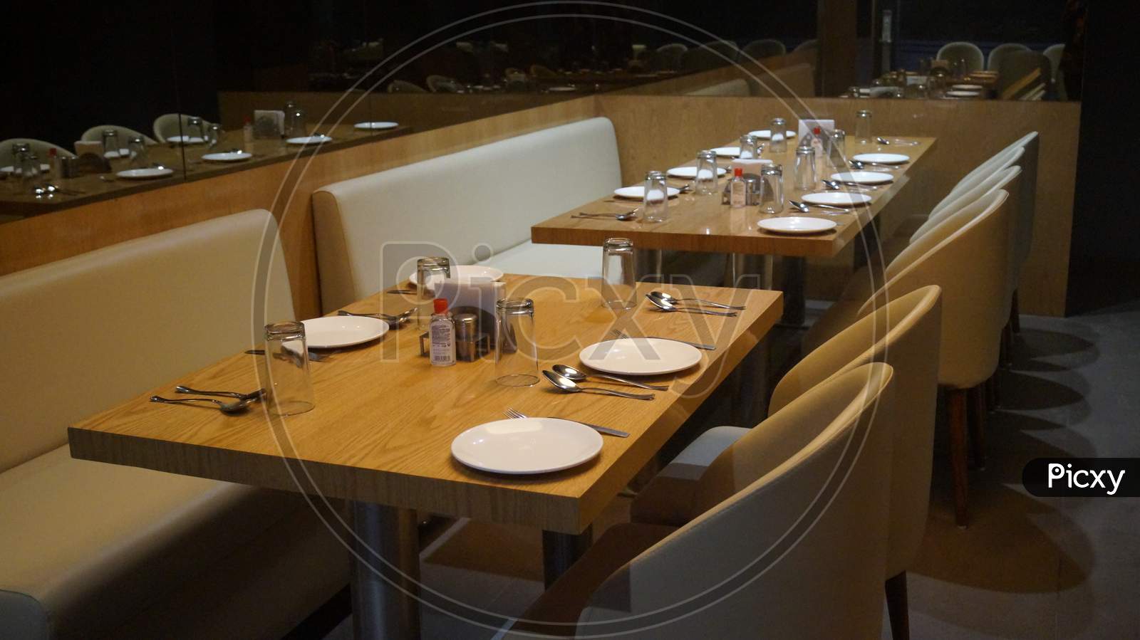 Photo of a restaurant is a new opening. Photo of the setup of that table.