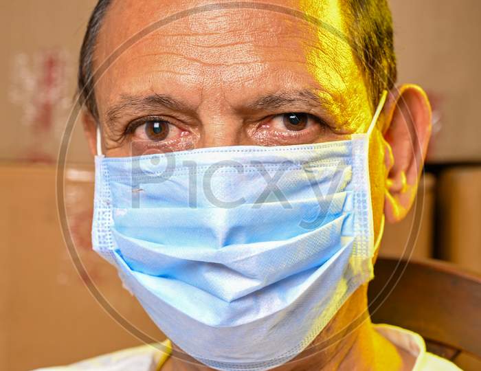 Title: Senior citizen man with mask COVID time