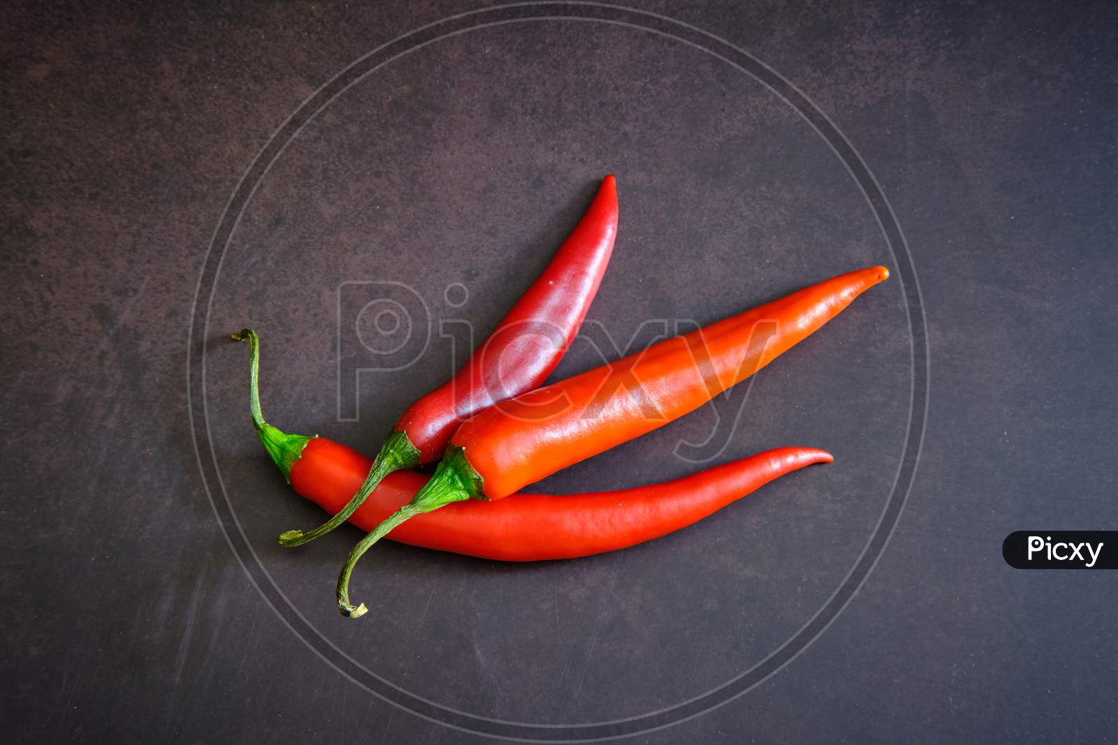 Red Chilli Pepper On Dark Background