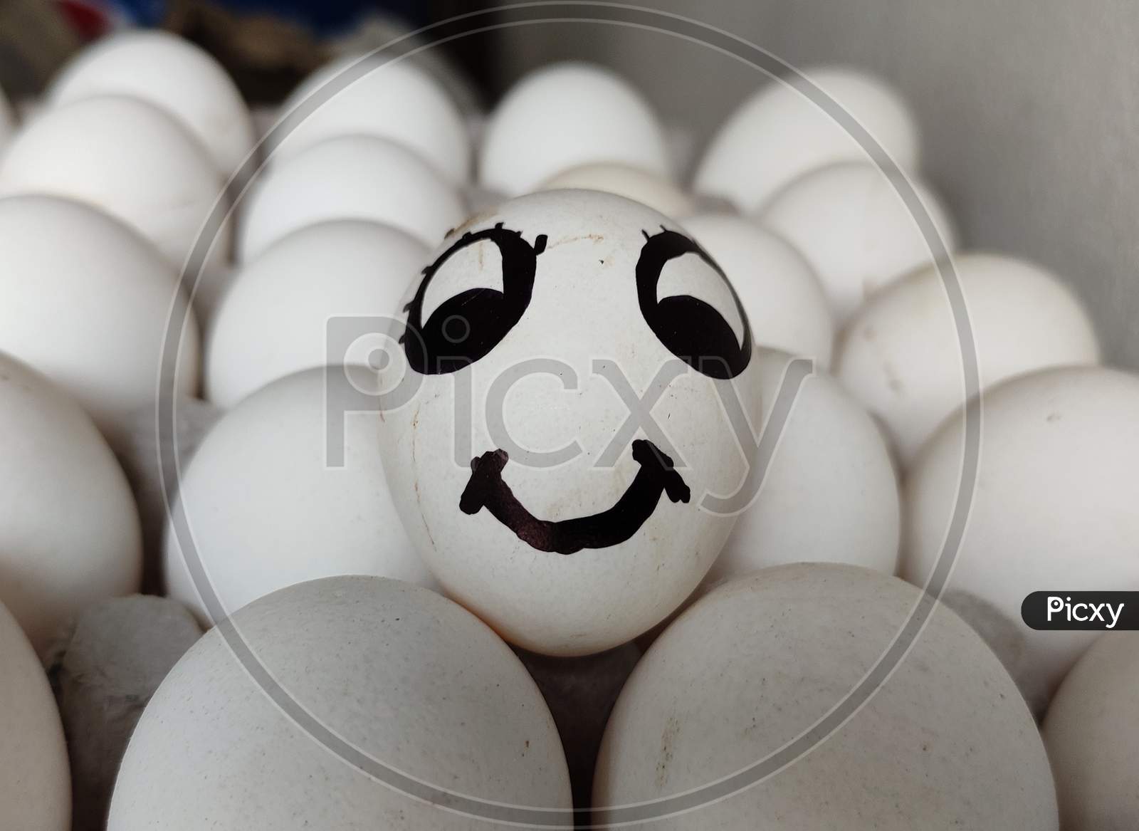 Smily face of egg.