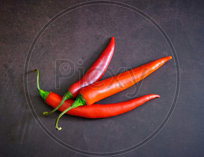 Red Chilli Pepper On Dark Background