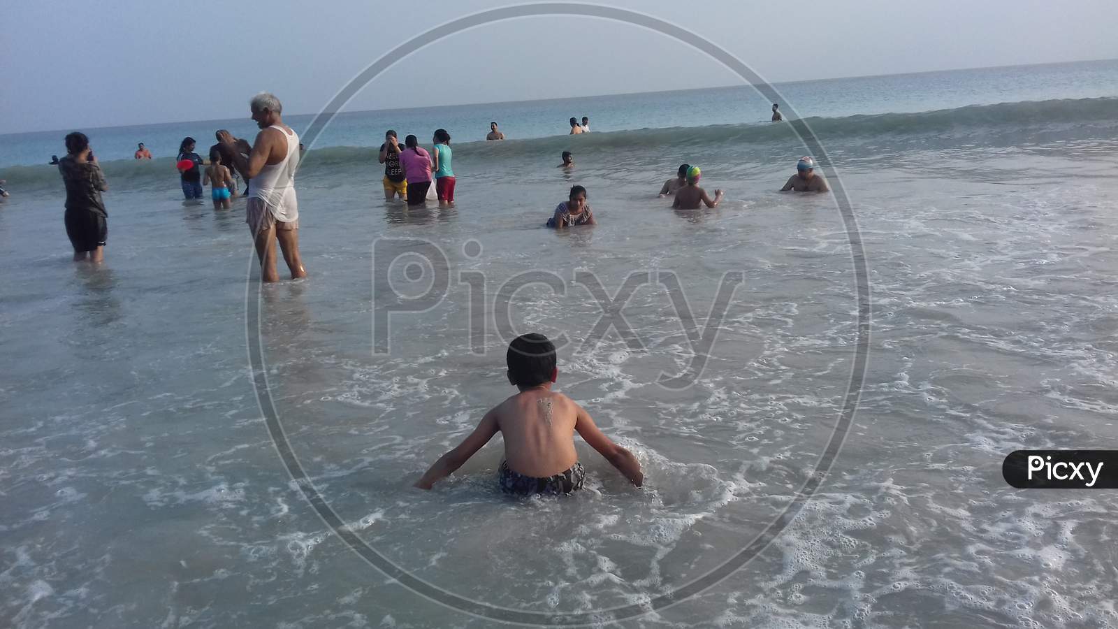 tourist having fun time at Radhanagar Beach, Havelock Island