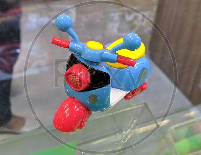Baby plastic motorcycle toy.