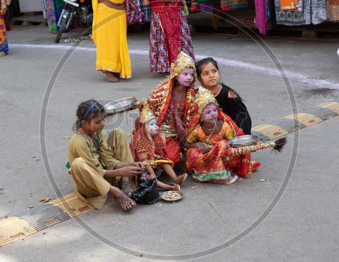 A group of little girls dressed as Hindu Goddess on the streets of Pushkar
