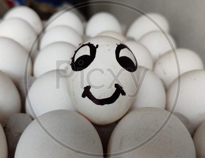 Smily face of egg.
