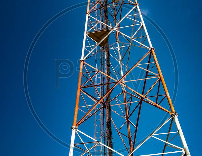 Mobile network tower and blue sky image