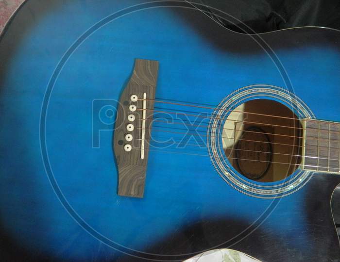 Blue Black acoustic guitar