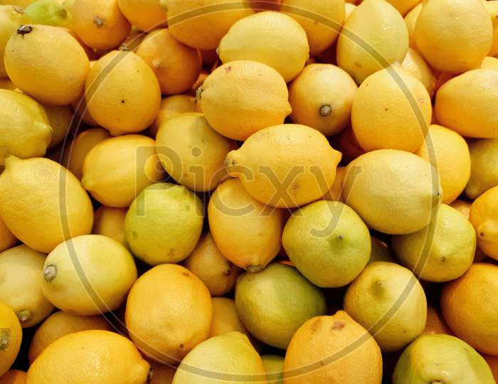 Yellow Lemons For Sale In Supermarket