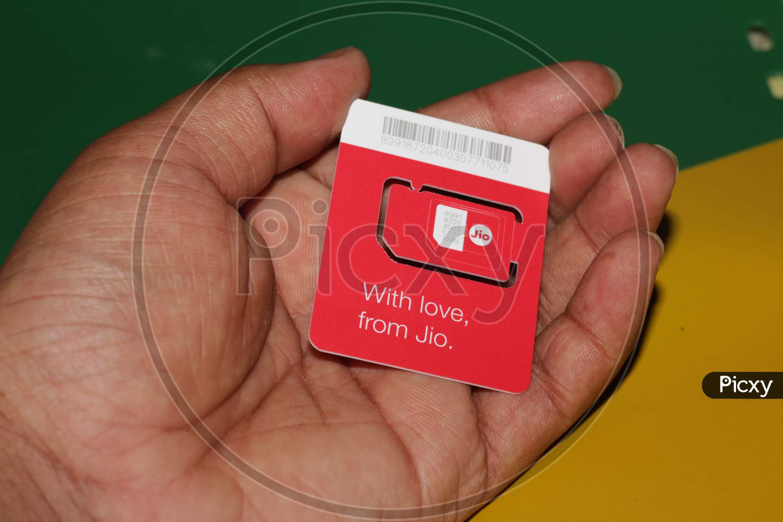 Jio Sim Cards In Hand With Every Jiofi Or 4G Smartphone