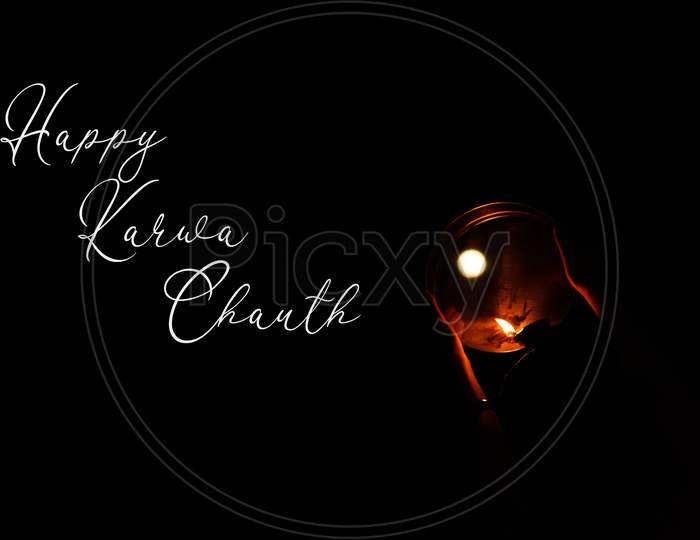 Illustration of Happy Karwa chauth greeting wish poster card with moon glowing diya on black background