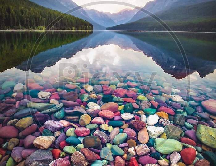 Multicolored stones in a clear water
