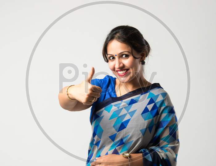 Portrait Of Successful Pretty Indian Asian Young Woman In Sari Or Saree With Hands Crossed