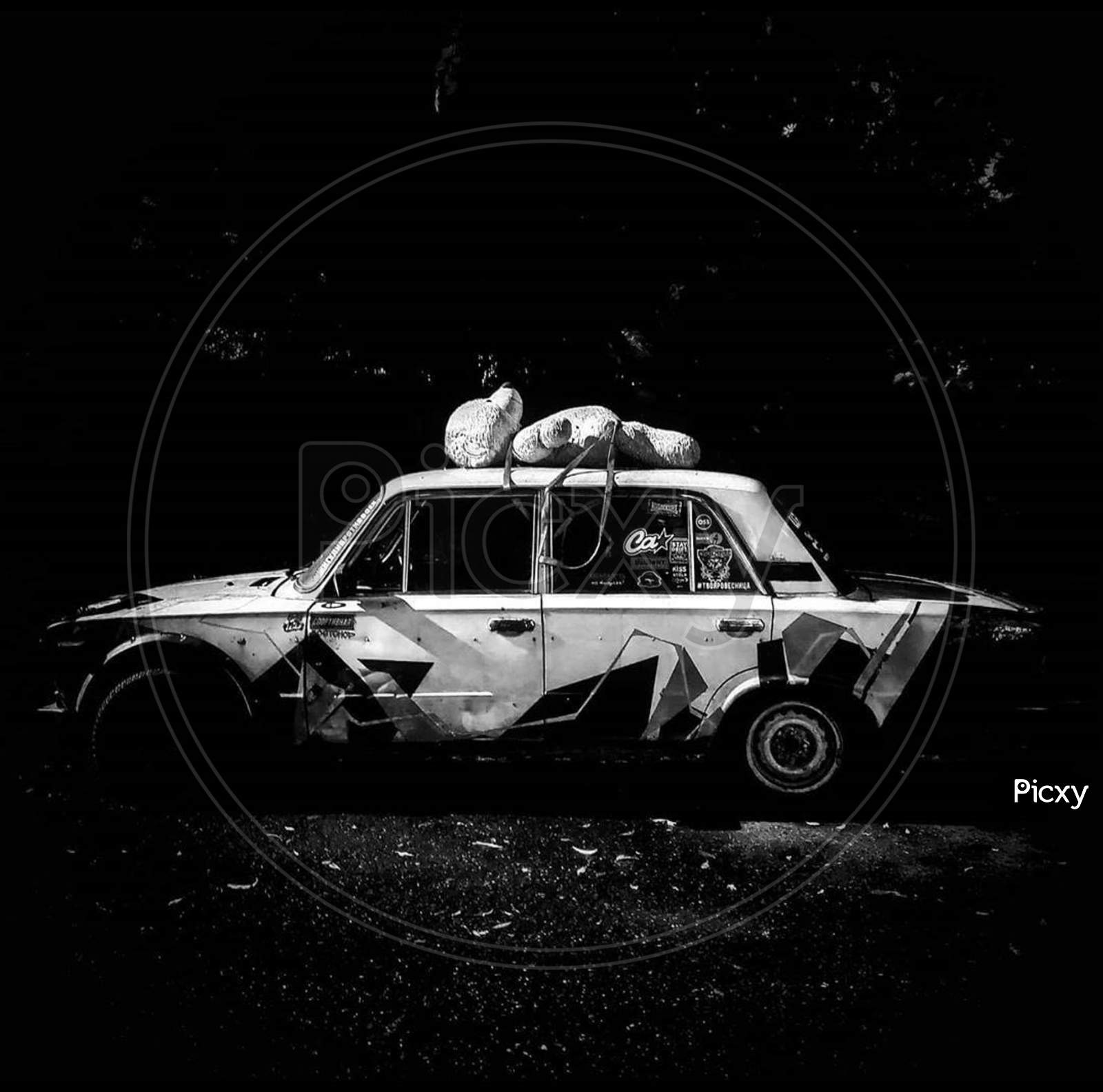 A vintage car with black background