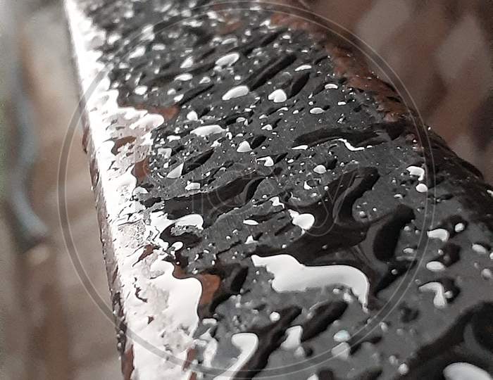 Water on the railing