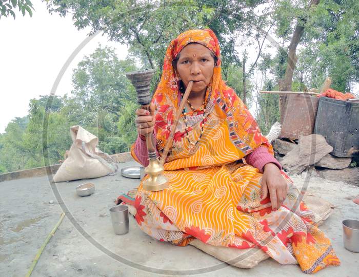 woman smoker at rural indian village