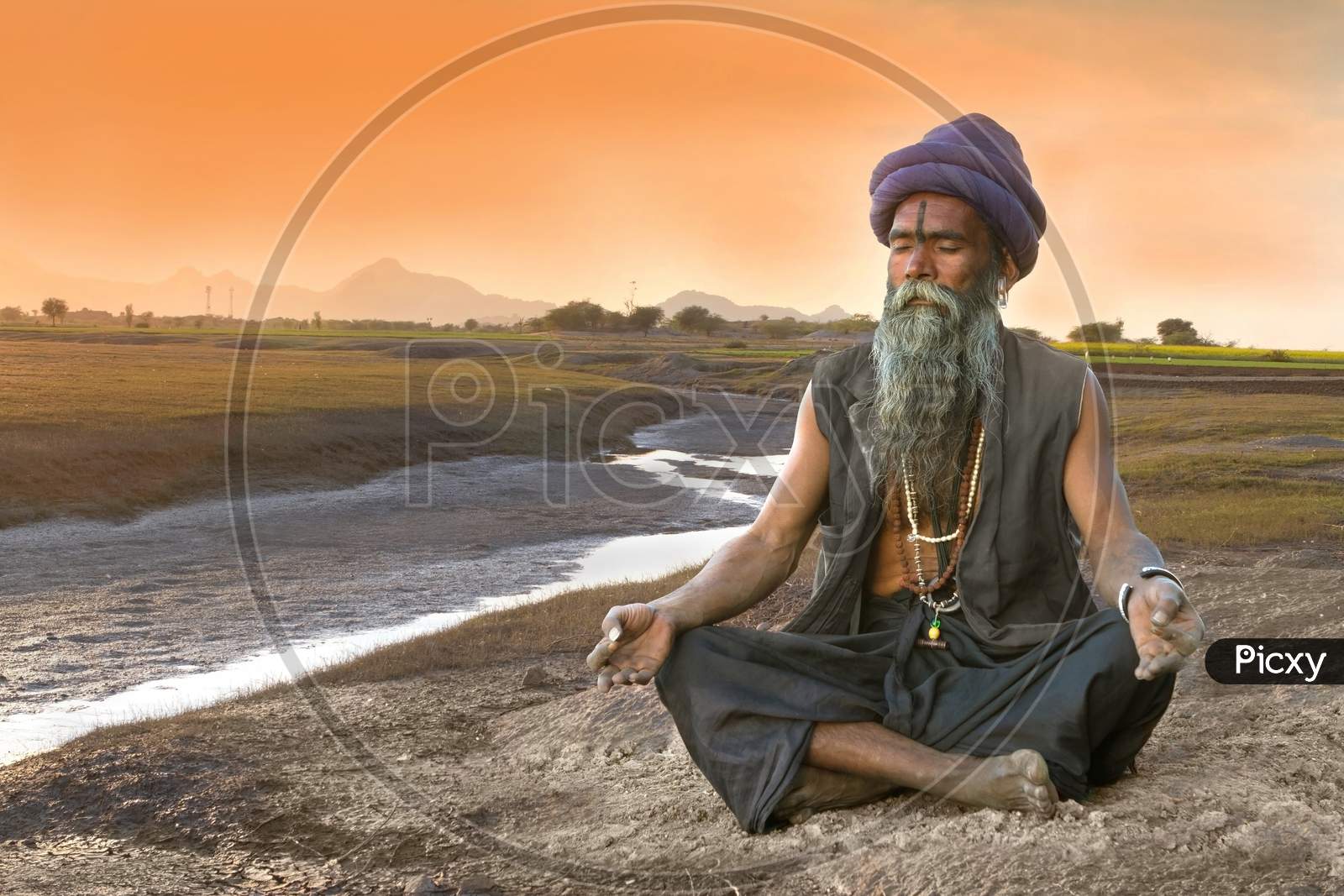 Sadhu Meditation Near River