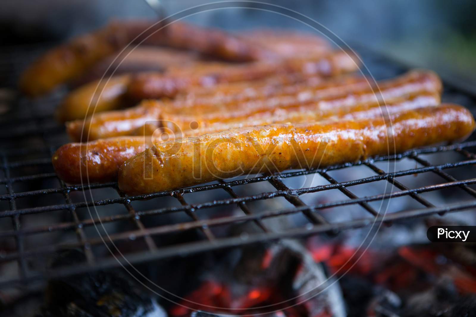 Delicious Sausages Are Grilled And Ready To Be Served To Guests.