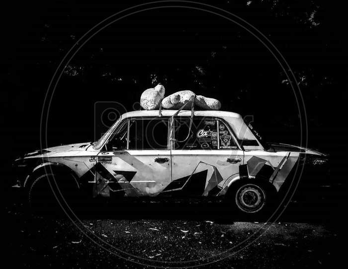A vintage car with black background