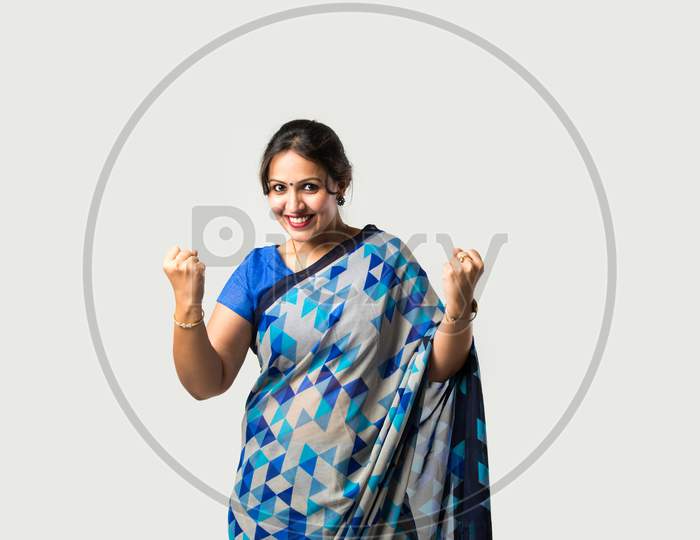 Portrait Of Successful Pretty Indian Asian Young Woman In Sari Or Saree With Hands Crossed