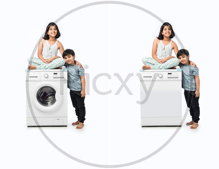 Indian Asian Kids Showing Washing Machine Or Dish Washer