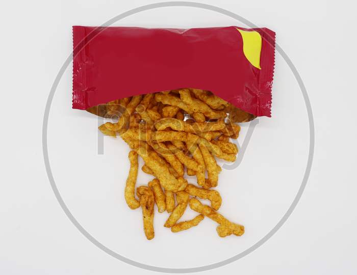 Healthy crunchy snack,Kurkure snack,Evening Snack or the Tea Snack,Kurkure is an evening snack that is manufactured using edible ingredients like rice meal, Background Texture with wrapper.