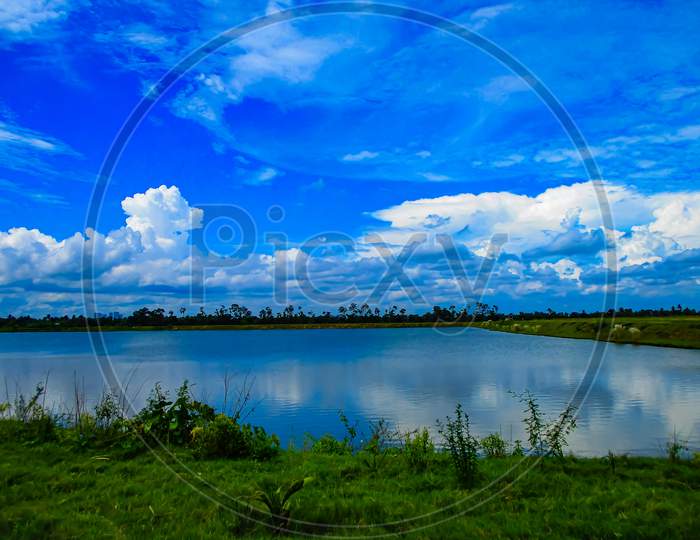 Beautiful landscape with blue sky and lake in westbengal