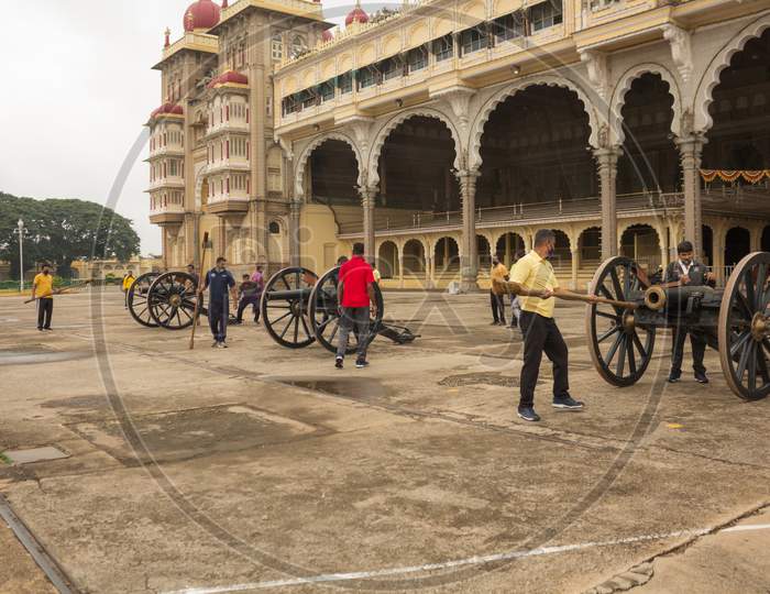 A Dramatic view of a Canon Drill being Rehearsed by the Royal Army personnel for the Dasara festival inside Ambavilas Palace in Mysuru of Karnataka/India.
