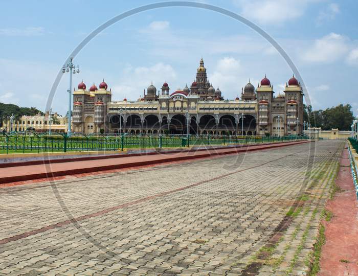 A Decked up Ambavilas Palace against the Clouds for the Dasara festival at Mysuru in Karnataka/India.