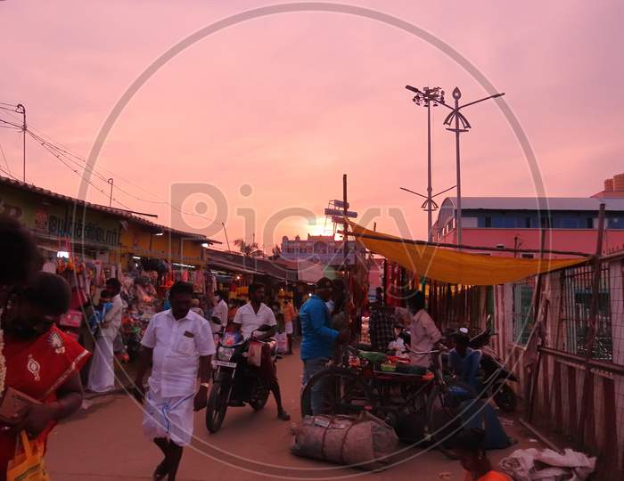 Morning Sunrise With A Street Market Or Traditional Fair Outside The Hindu Temple