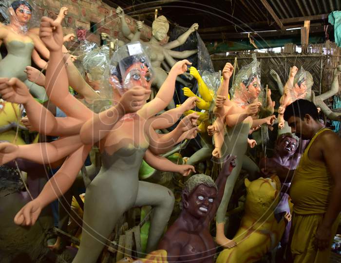 Durga idol is being prepared by an artist ahead of the biggest Hindu festival Durga puja in Nagaon District of Assam on Oct 9,2020