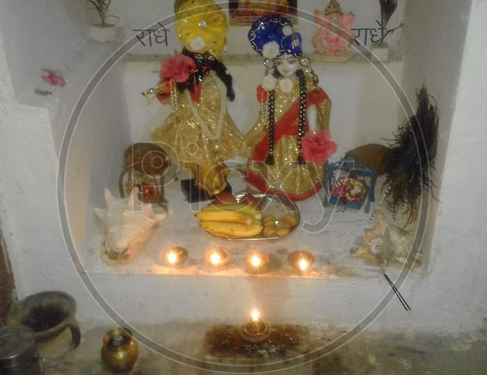 radhakrishna worship by oil lamp