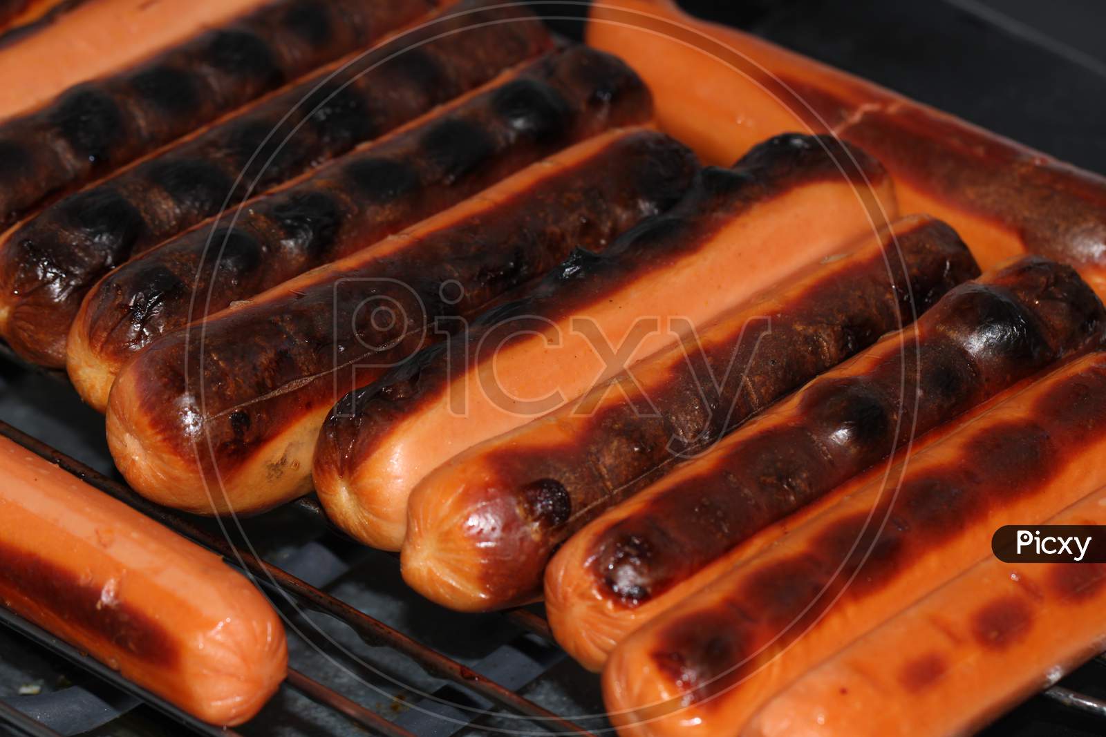 Hot dogs fried on the grill