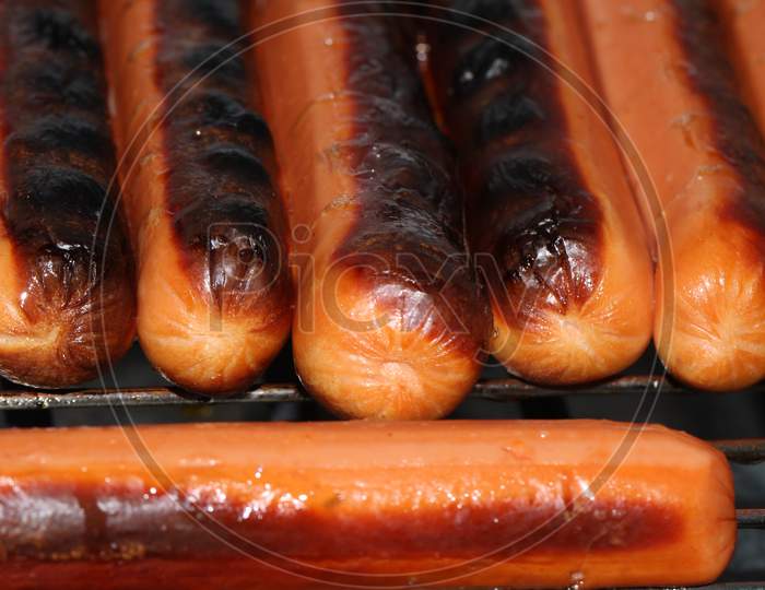 Hot dogs fried on the grill