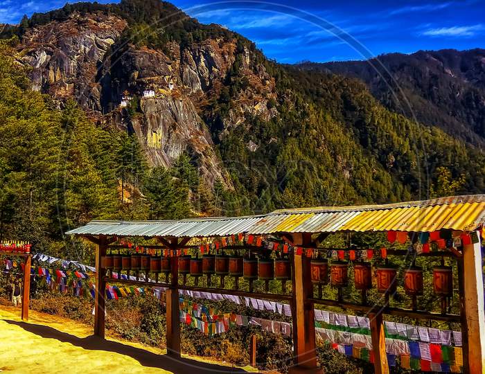 Beautiful Mountainous Landforms and Buddhist Prayer Wheels