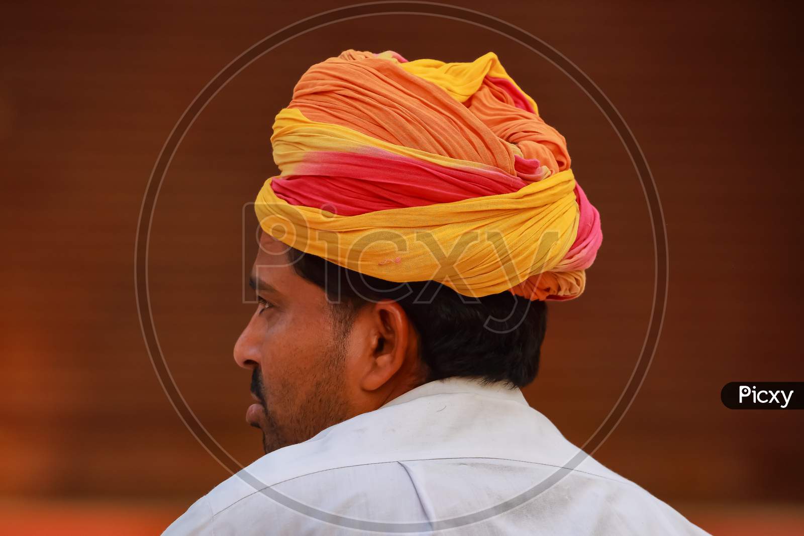 Abstract side portrait of a Rajasthani man wearing a colorful turban