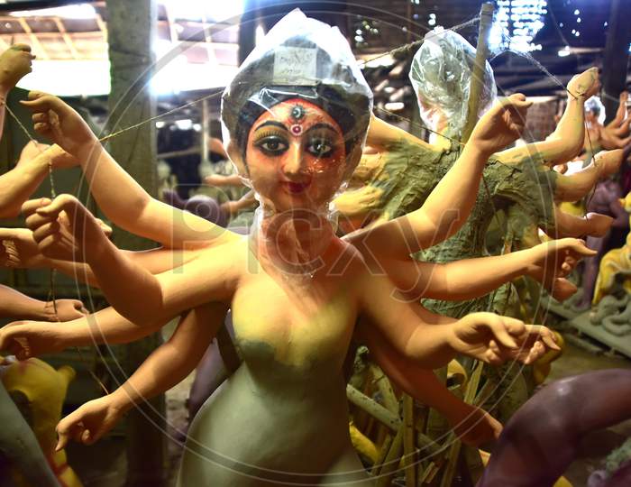 Goddess Durga idols prepared by an artist for the upcoming Durga Puja celebration in Nagaon District of Assam on Oct 9,2020