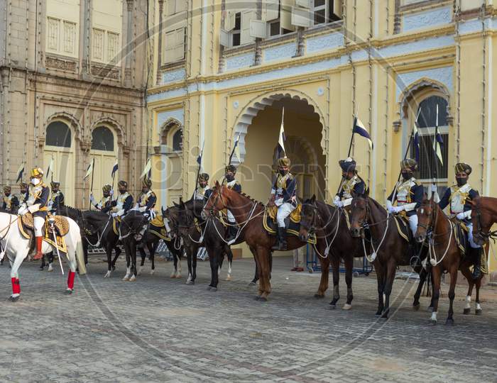 A beautiful view of the Horsemen and their Horses belonging to the Royal Palace seen participating in the Dasara Parade in front of the Iconic Heritage Palace in Mysore/India.