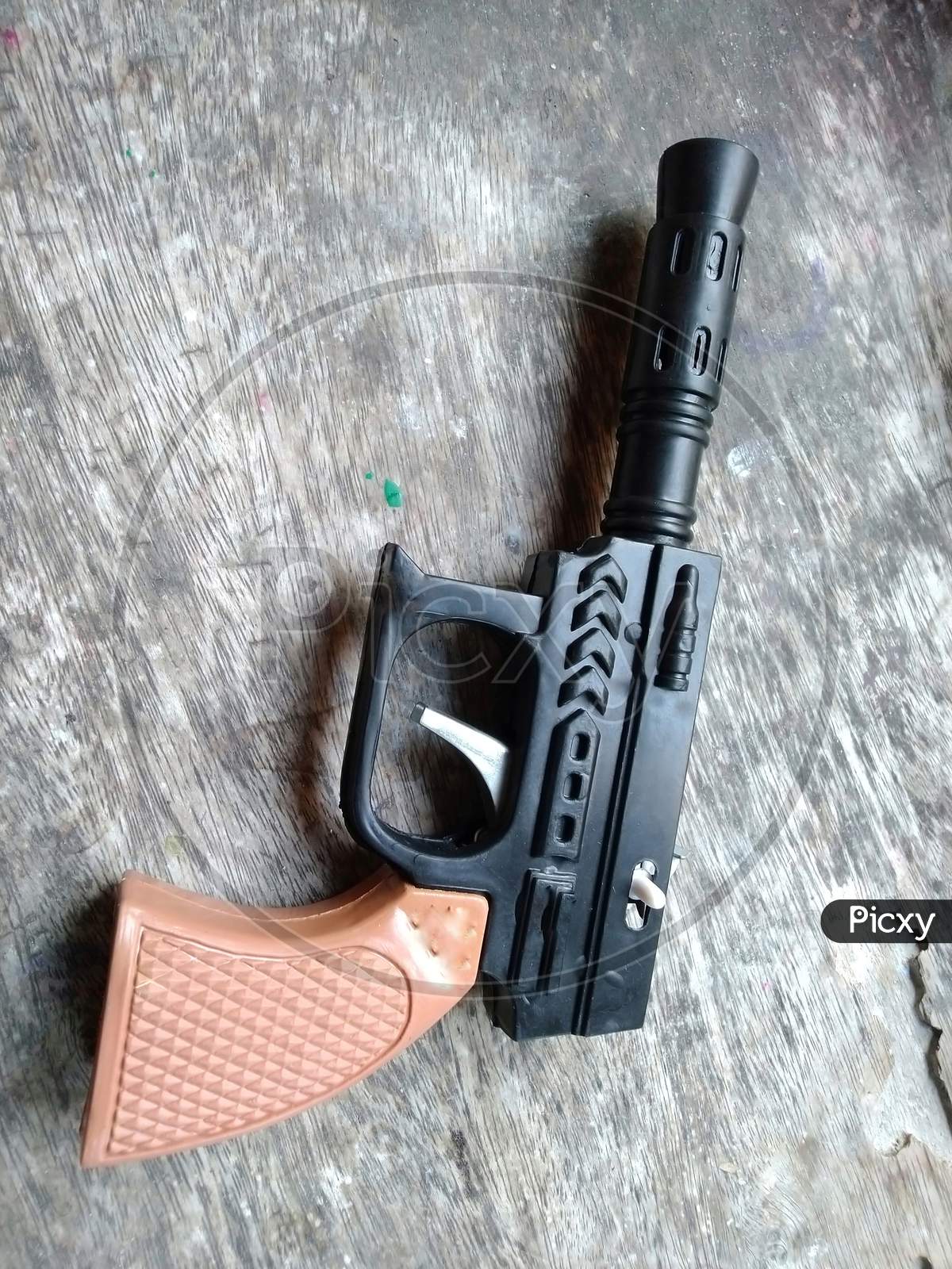A close view of baby toy gun