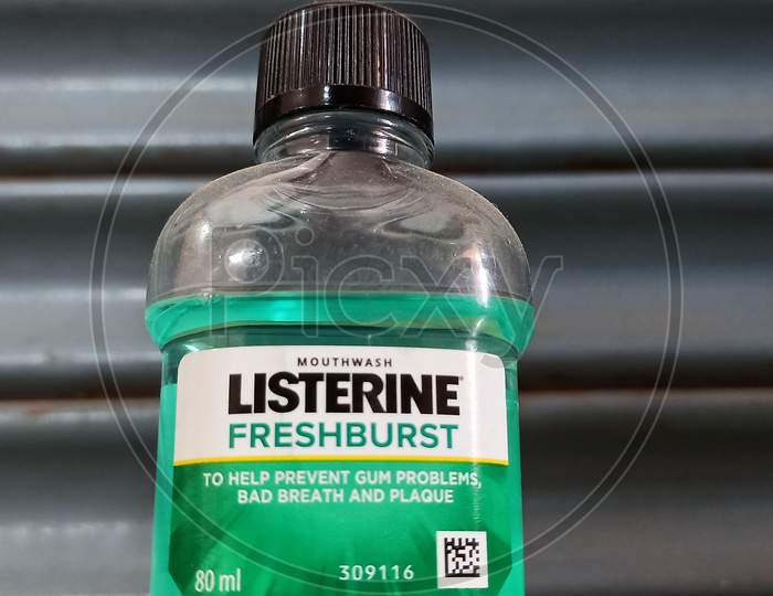 plastic mouth freshener bottle