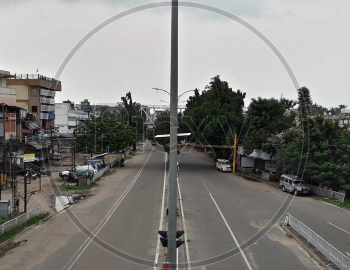 Indian road, top view, sky, buildings trees, Cuttack, Odisha, rainy image, street