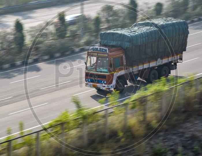 A container lorry moving on a Highway