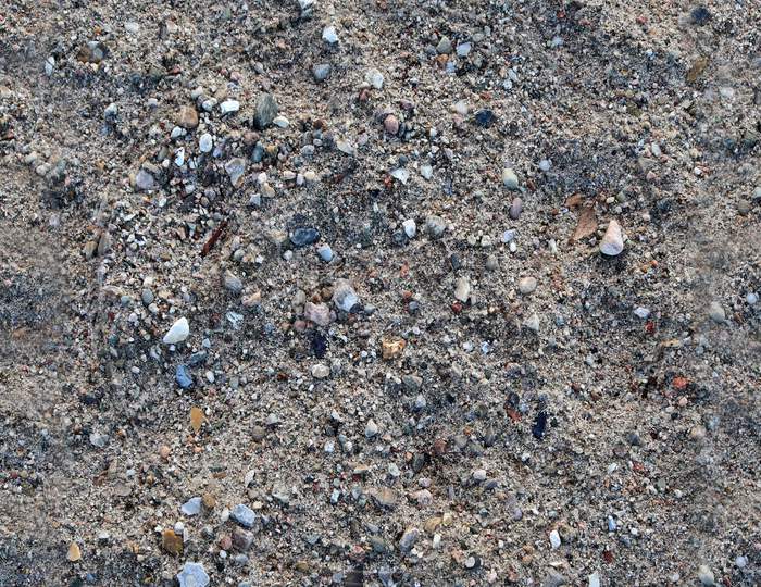Photo Realistic Seamless Texture Pattern Of Sand At A Beach