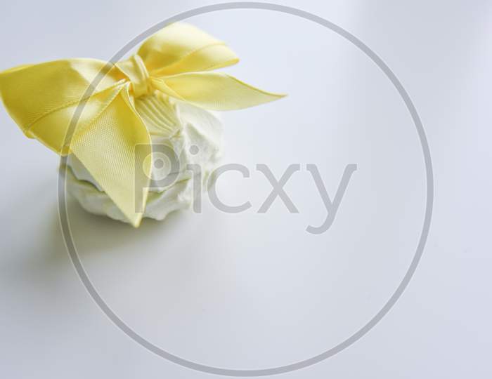 Selective Focus At The Light Green Marshmallow With Yellow Ribbon