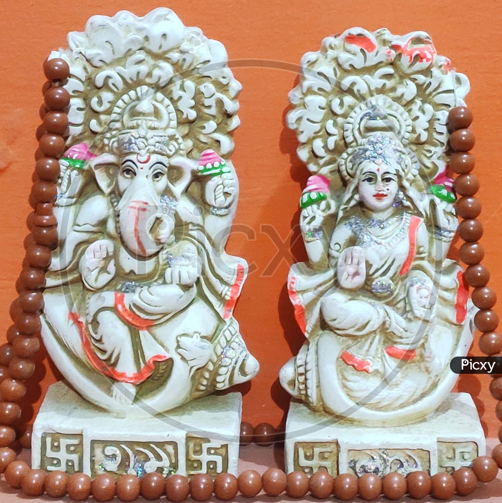 Sculpture of Lord Ganesha and mata laxmi