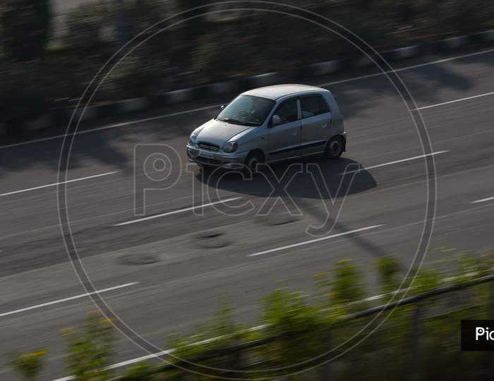 Fast moving car on Outer Ring Road, Hyderabad
