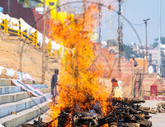 A Burning Pyre At Ghat Of Varanasi