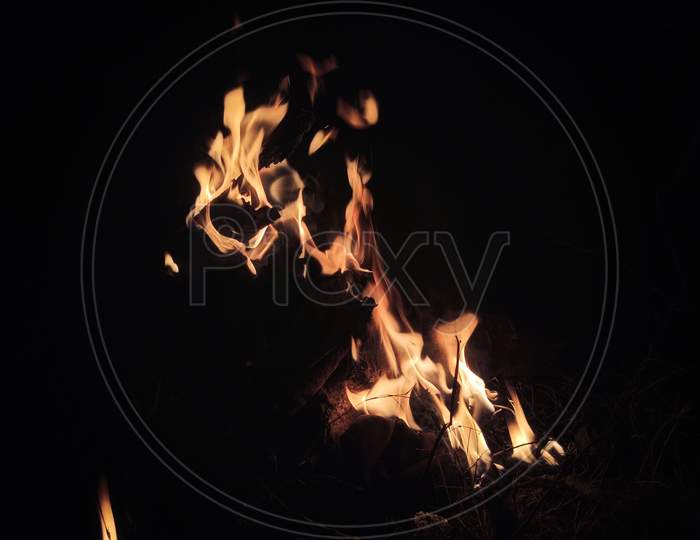 Night bonfire camp in winter season.