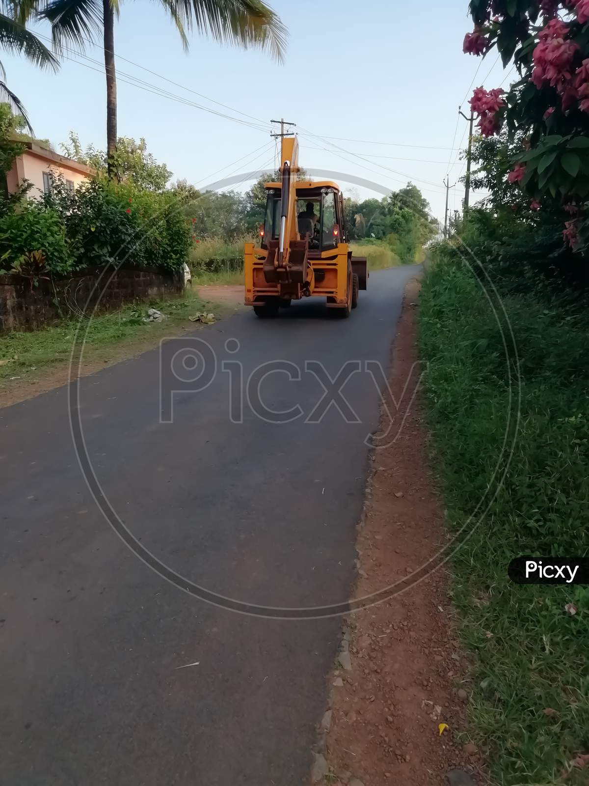 View Of The Street Road With An Earth Mover Vehicle