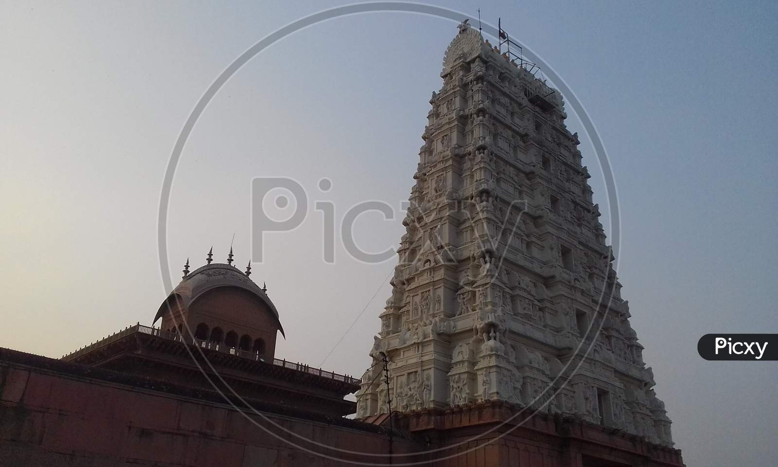 Shri Rang Nath Ji Temple, Vrindavan Ancient sri krisna balaram temple in Vrindavan wit golden pole. te temple design is sout indian type.